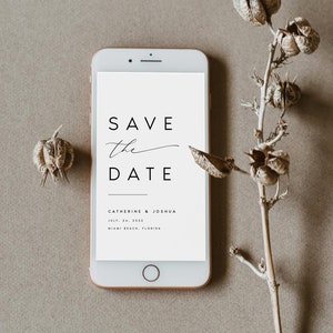 May include: A white smartphone screen displaying a save the date announcement for Catherine & Joshua, with the date July 24, 2022 and location Miami Beach, Florida.