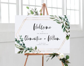 May include: Welcome sign with gold geometric frame and greenery. The sign reads "Welcome to the wedding of Clementine + William 24.08.2021 London, England"