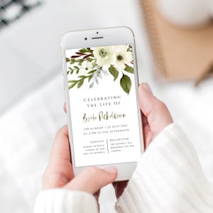 May include: A white and green floral phone screen with a gold text overlay. The text reads "Celebrating the life of Brooke Richardson. On Sunday, 22 July 2021 at 2 pm in the afternoon. Service: Roman Catholic Church of Our Lady of Muswell. Reception: 180 Muswell Hill Broadway N10 35A London."