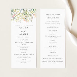 May include: Elegant wedding program featuring floral accents and the names Camila and Robert. The program includes the wedding ceremony details, date, and location, along with the wedding party details.