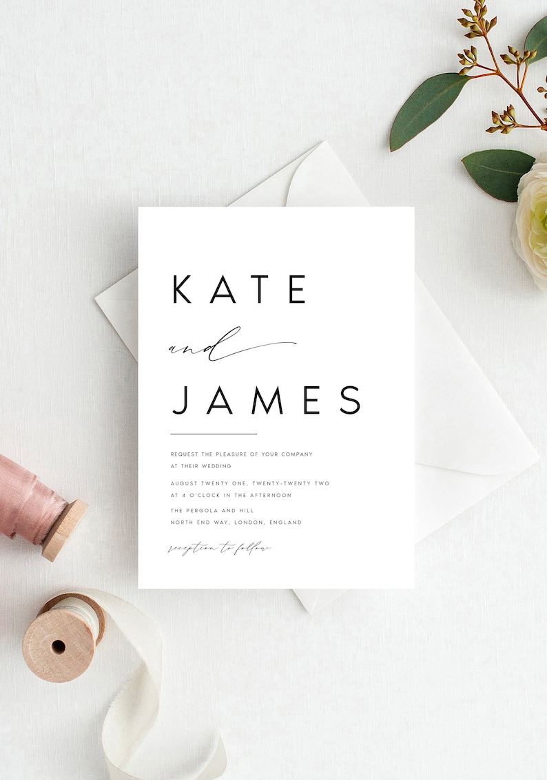 May include: A simple wedding invitation featuring the names "KATE" and "JAMES" in a contemporary font. The invitation includes event details and is set against a white background with a white envelope and floral accents.