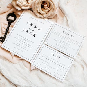 May include: A white wedding invitation suite with black text. The main invitation card features the names "Anna and Jack" and details about the wedding ceremony. The second card includes details about the wedding reception and the RSVP card has a space for guests to provide their names and meal choices.