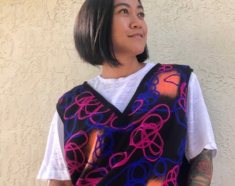 Neon Pop Art Sweater Vest - Mod Style Swirly Colors V-Neck Sweater Vest - Women's Sleeveless Black Jumper in Highlighter Colors