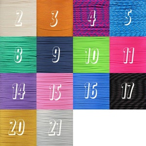 May include: A collection of 21 different colors of paracord, each with a number label. The paracord is arranged in a grid pattern.