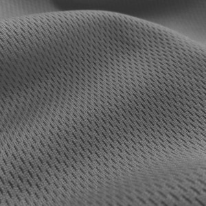 May include: Close-up of a gray, textured fabric with a subtle diamond pattern. The fabric has a soft, breathable feel.