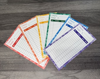 May include: Six colorful budget trackers with a watercolor design. Each tracker has a heading that says "Category Budget $".