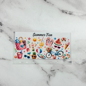 May include: A rectangular sticker sheet featuring the text Summer Fun and various watercolor illustrations including a pink polka dot tote bag, a blue bicycle, a pineapple, a watermelon slice, flip-flops, an ice cream cone, and a beach ball.
