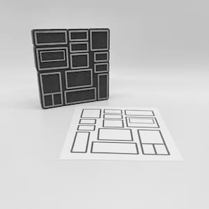 May include: A dark gray, geometric puzzle with various rectangular shapes and a matching paper template. The puzzle pieces have silver outlines, and the design is set against a white background. The shapes vary in size.
