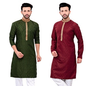 May include: Two men's long-sleeved shirts with a mandarin collar and gold embroidery. The shirt on the left is green and the shirt on the right is maroon. Both men are wearing white pants and brown shoes.