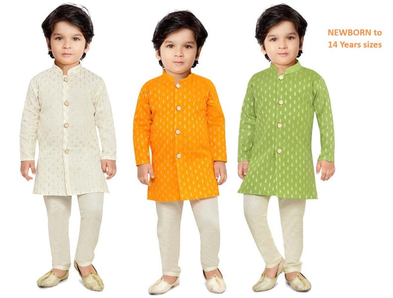 May include: Three young boys wearing traditional Indian clothing. The boys are wearing white trousers and a long-sleeved shirt with a button-up collar. The shirts are in three different colours: white, orange, and green. Each shirt has a small, repeating pattern. The text "NEWBORN to 14 Years sizes" is in the top right corner of the image.