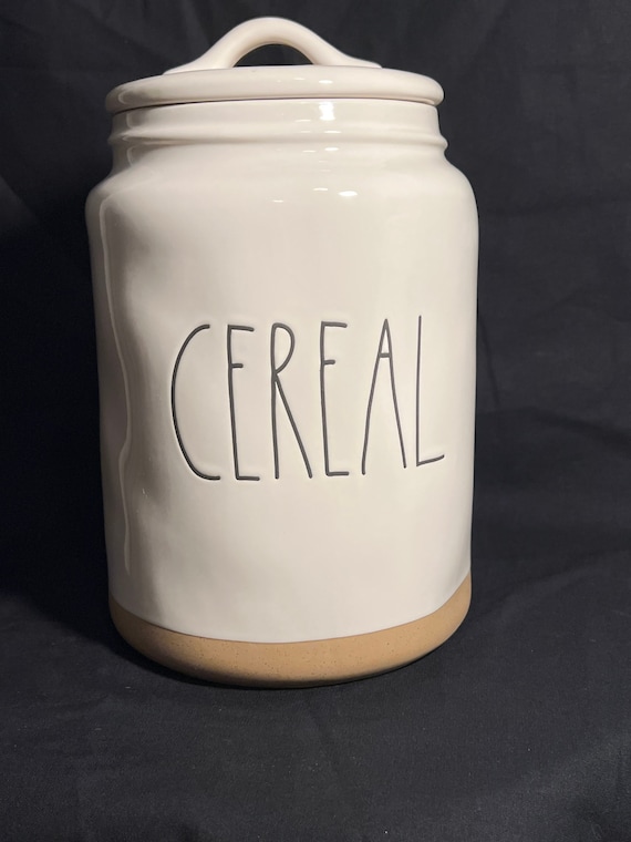 White Ceramic cereal Canister With a Sandy Textured Base 