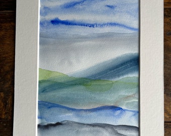 Modern and contemporary abstract landscape watercolour painting. Restful and calming with blues, greys and greens.