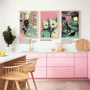 May include: Three digital art prints featuring black cats in different settings. The first print shows a black cat driving a futuristic vehicle. The second print shows two black cats wearing space suits. The third print shows a black cat sitting in a futuristic room with a computer screen. The text "Glorious Critters" is printed below the second print.