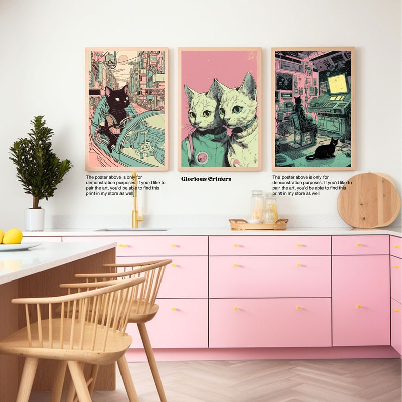 May include: Three digital art prints featuring black cats in different settings. The first print shows a black cat driving a futuristic vehicle. The second print shows two black cats wearing space suits. The third print shows a black cat sitting in a futuristic room with a computer screen. The text "Glorious Critters" is printed below the second print.