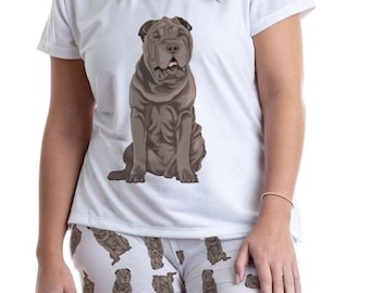 May include: White pajamas with a brown Shar-Pei dog print. The top has a single image of the dog on the front, while the pants have a repeating pattern of the dog.