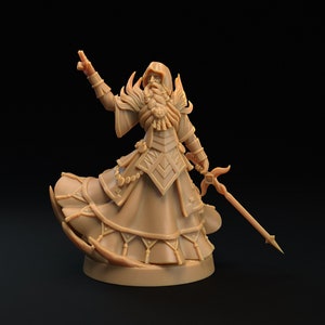May include: A detailed miniature figurine of a wizard wearing a flowing robe and holding a staff. The figurine is made of a light brown plastic and is posed in a dramatic stance.