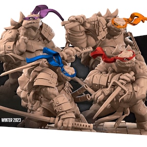 May include: Four detailed, unpainted, plastic figurines of Teenage Mutant Ninja Turtles, each wearing a different colored bandana. The turtles are posed in fighting stances, holding weapons. The text "WINTER 2023" is visible in the bottom left corner of the image.