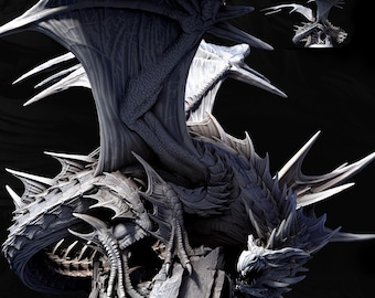 May include: A detailed, grayscale dragon sculpture with large, textured wings and sharp spines. The dragon is perched on a rocky base, with intricate detailing on its scales and claws. A smaller version of the dragon is visible in the background.
