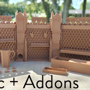 May include: A set of brown 3D printed castle walls with a honeycomb design and various accessories, including a mug, a small box, and a few other pieces. The text "Basic + Addons" is printed on the table in front of the castle walls.