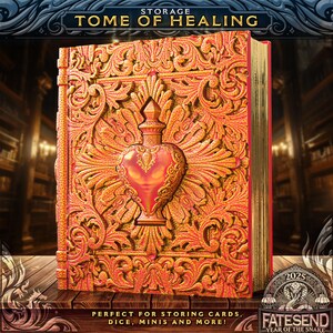 May include: A rectangular storage box designed like a book titled TOME OF HEALING. The cover is orange and gold with an embossed heart-shaped bottle at the center, surrounded by intricate floral patterns. The page edges are metallic gold.