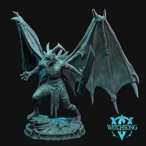 May include: A gray, detailed miniature figurine of a winged demon with sharp claws and teeth. The demon is posed in a menacing stance, with its wings spread wide. The figurine is set on a rocky base.