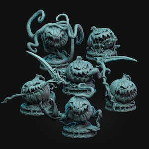 May include: A collection of teal-colored, carved pumpkin figurines with menacing expressions. Each pumpkin has a unique design, some with vines and scythes, creating a spooky Halloween theme. The pumpkins are displayed on decorative bases.