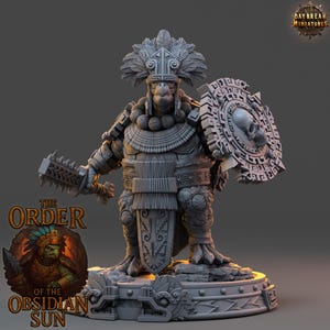 May include: A detailed gray miniature figure of a warrior, holding a spiked club and a shield with a skull emblem. The figure is adorned with intricate armor and a feathered headdress. The base features detailed carvings. The text "THE ORDER OF THE OBSIDIAN SUN" is visible.