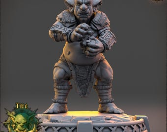 May include: A gray, detailed miniature of a goblin-like creature with large ears, a fierce expression, and a muscular build. The creature is wearing armor and holding a small object in its hand. The miniature is standing on a circular base with a textured surface.