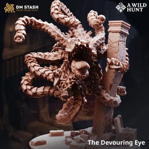 May include: A detailed, brown 3D-printed miniature of "The Devouring Eye," a monstrous creature with multiple tentacles and a large central eye. The creature is posed near a crumbling pillar, with the text "The Devouring Eye" at the bottom.