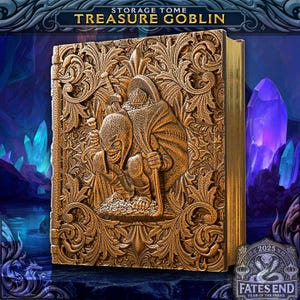 May include: A gold-colored storage tome with the text "TREASURE GOBLIN" at the top. The cover features a detailed relief of a goblin character. The book's spine and edges are also gold. The bottom right corner has a logo that says "FATES END YEAR OF THE SNAKE 2025".