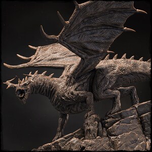 May include: A detailed, textured, bronze-colored dragon sculpture with wings spread wide. The dragon is perched on a rocky outcrop, its head turned to the side, and its mouth open in a fierce roar.