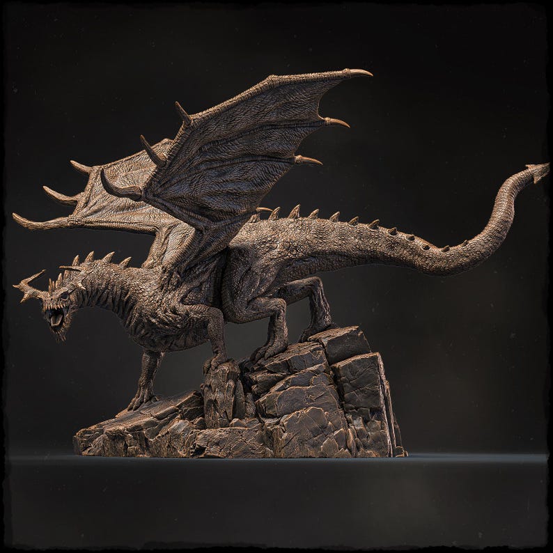 May include: A detailed bronze sculpture of a dragon with outstretched wings, perched on a rocky base. The dragon has a fierce expression and sharp claws.