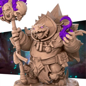 May include: A brown, sculpted figurine of a reptilian creature wearing a robe and holding a staff topped with skulls and purple flames. The creature has a toothy grin and purple glowing eyes.