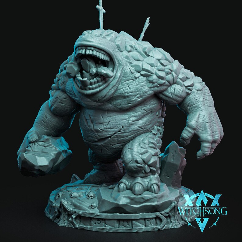 May include: A gray, stone-like creature with a gaping maw, holding a rock in its left hand. The creature is standing on a circular base with a raised edge and a design of runes around the edge. The base is made of a similar gray material as the creature. The creature is a miniature figurine, likely for a tabletop game or role-playing game.