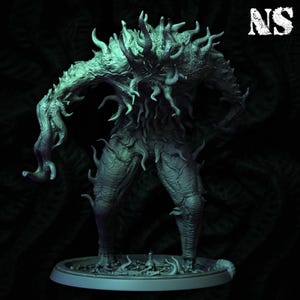 May include: A detailed, green-toned sculpture of a monstrous figure with a gnarled, textured appearance. The creature has multiple tendrils and a humanoid form, standing on a circular base. The initials "NS" are in the upper right corner.