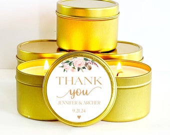 May include: Gold candle tins with floral designs and the text "Thank you" in a script font. The text also includes the names "Jennifer & Archer" and the date "9.21.24".