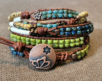 My bestseller! Boho-Style bead and leather wrap bracelet using Picasso beads and daisy beads and either copper or silver button closure.