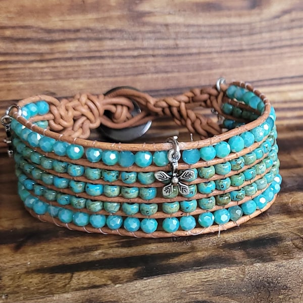 Handmade Five-row turquoise Picasso bead and light brown leather cuff bracelet with square knot button closure.