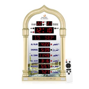 May include: A gold-colored digital wall clock with a decorative arch design. The clock displays the time, date, and prayer times in red digital numbers. A remote control is included.