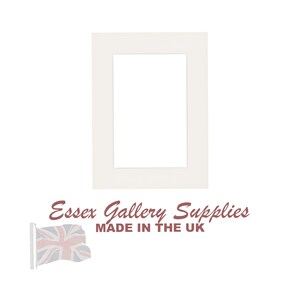 May include: White mat board with a rectangular opening in the center. The mat board is made in the UK by Essex Gallery Supplies.