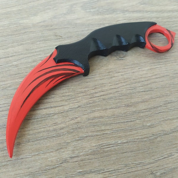 Wooden mock-up of a karambit claw knife for fans of computer games, toy