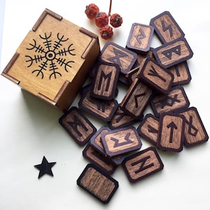 Set of runes of the Elder Futhark Helm of Awe in wooden box with linen pouch