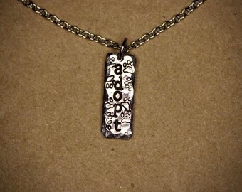 Adopt Silver Hammered Necklace with Paw Prints Adopt Don’t Shop