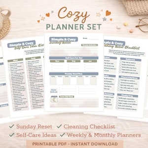 May include: A cozy planner set with a coffee cup, glasses, and a neutral background. The set includes weekly and monthly planners, self-care ideas, and a cleaning checklist. The text on the planner reads "Cozy Planner Set."