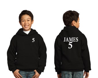 May include: Black hooded sweatshirt with the name "JAMES" and the number "5" printed on the back. The front of the sweatshirt has the number "5" printed on the left chest.