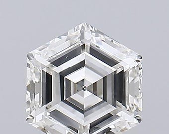 May include: A clear, faceted gemstone with a unique hexagonal shape. The gem features a complex internal structure with multiple layers and geometric patterns, creating a sparkling effect. The overall design is symmetrical and modern.