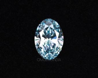 May include: A brilliant, oval-cut, light blue gemstone against a black background. The gem's facets reflect light, creating a sparkling effect. The image is a close-up, highlighting the gem's clarity and color. The text "OMGEMMONDIA" is visible in the lower right corner.
