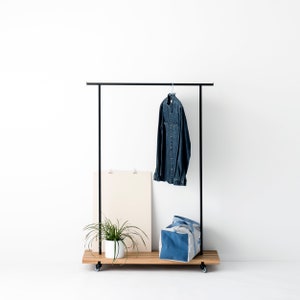 Clothes rack made of oak wood and black powder-coated metal
