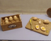 Dollhouse Miniature egg holder and boiled eggs on cutting board, 1 12 scale.