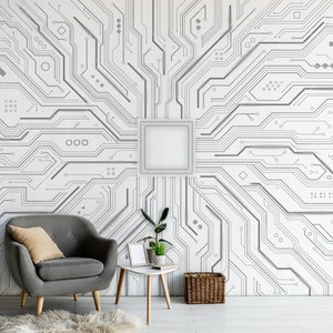 Puede incluir: Una pared blanca con un patrón de placa de circuito gris y blanco. Un sillón gris con un cojín marrón se encuentra frente a la pared. Una mesa pequeña con un marco blanco y una planta en maceta se encuentra junto al sillón. Una cesta de mimbre se encuentra en el suelo junto a la mesa.